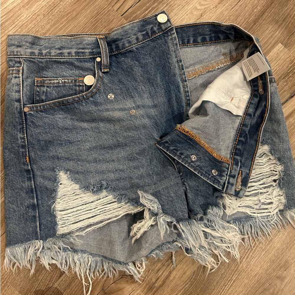 68. Blue and White High-Waisted Jean Shorts with Distressed Detailing - Picture 3 of 6